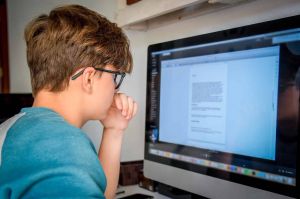 Boy Working in laptop